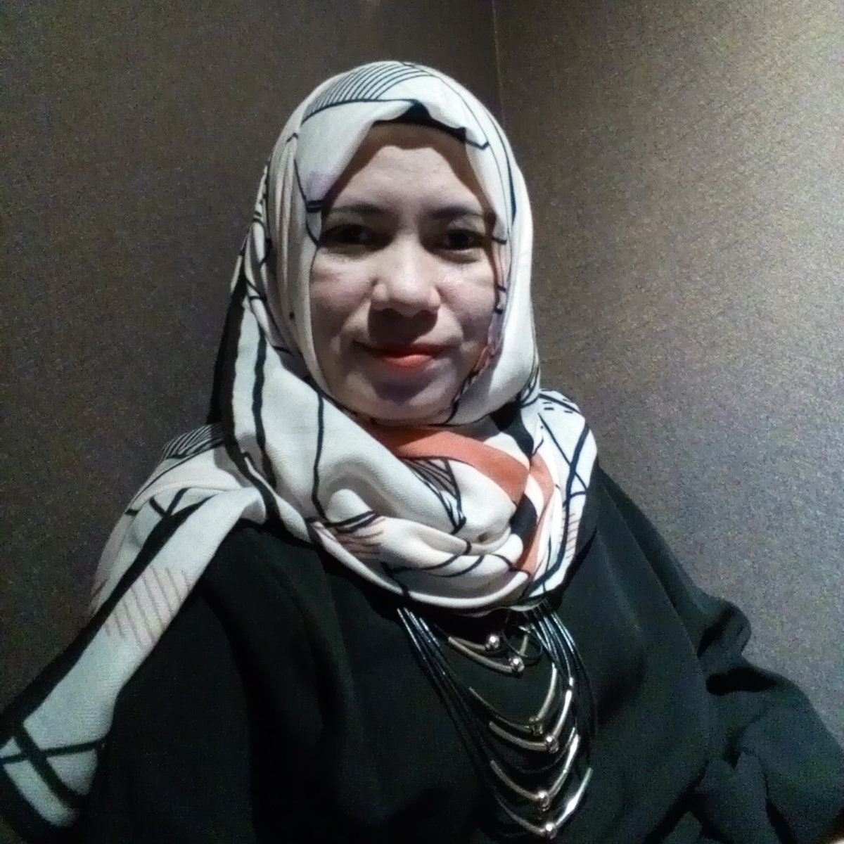 Taty Andriati Amrin